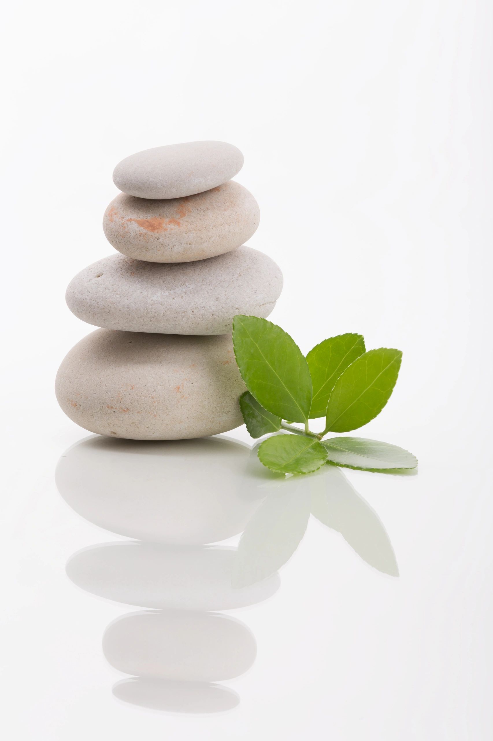 Balanced stones representing harmony and chakra alignment
